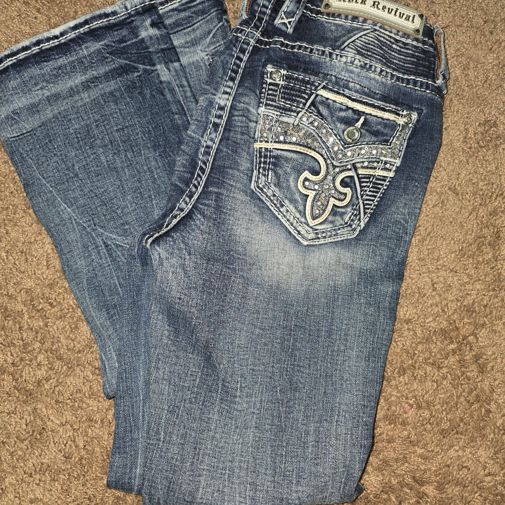 Rock Revival Blue Boot Cut Jeans with Ornate Back Design